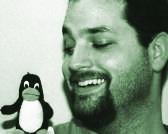 Bill Kendrick, with Tux the Linux mascot (Photo credit: John Marcotte) - billtux